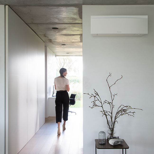 Daikin Emura white wall-mounted aircon hallway